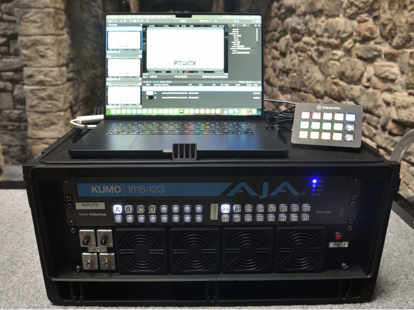 Custom Video Playback rig with a laptop, Stream Deck and rack-mounted video equipment